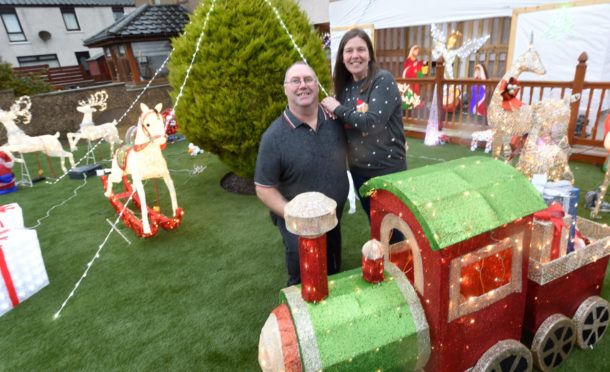 Sharon Reid and her partner Brian Wallace at their home in Peterhead.