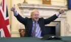 Prime Minister Boris Johnson reacts from 10 Downing Street as Britain and the European Union reach a deal.