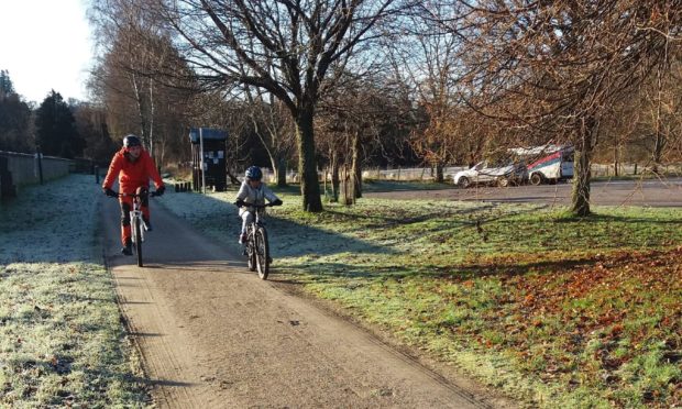 Cyclists on the Speyside Way in Aberlour.