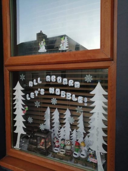 Elspeth Durrand has added snowmen to her window display for Connect at Christmas