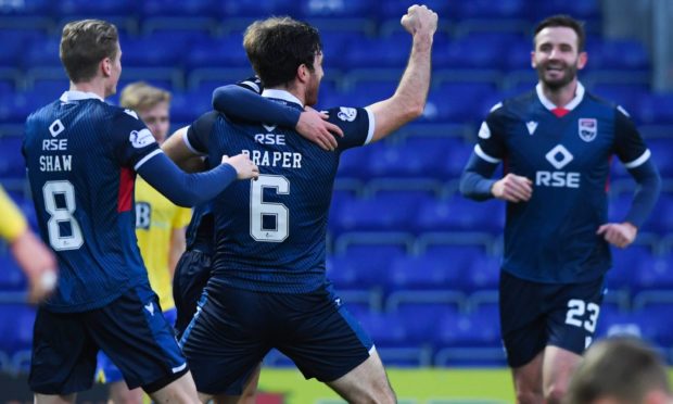 Ross Draper celebrates netting for Ross County.