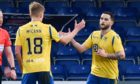 St Johnstone's Craig Conway (R) celebrates making it 1-1 with Ali McCann during the Scottish Premiership match between Ross County and St Johnstone at the Global Energy Stadium.