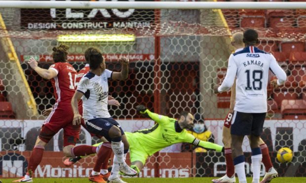 Rangers' Alfredo Morelos beats Joe Lewis to make it 1-0.