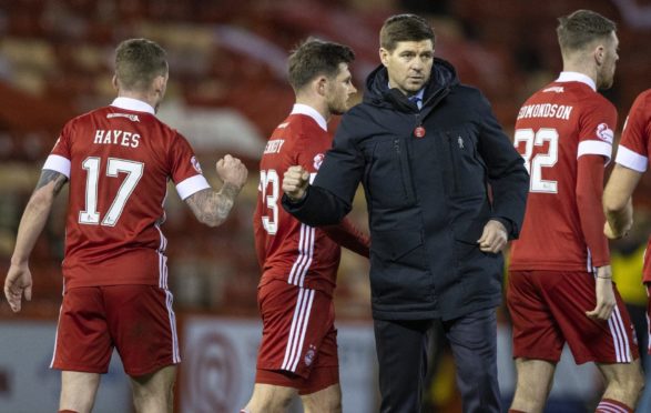 Rangers manager Steven Gerrard (right) with Jonny Hayes at full time in the match between Aberdeen and Rangers.