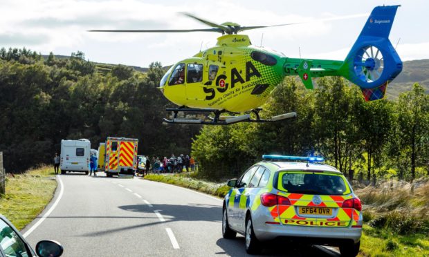 Scotland's Charity Air Ambulance (SCAA) touching down at the scene at Elphin.