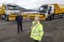 Councillor Trish Robertson checking out delivery of 10 new snow ploughs for Highland