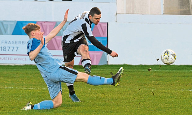 Scott Barbour scores against Turriff United for Fraserburgh as the Broch ran out 13-1 winners. Picture by Jason Hedges