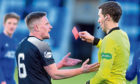 Peterhead's Simon Ferry is shown a red card against Cove Rangers. Picture by Chris Sumner