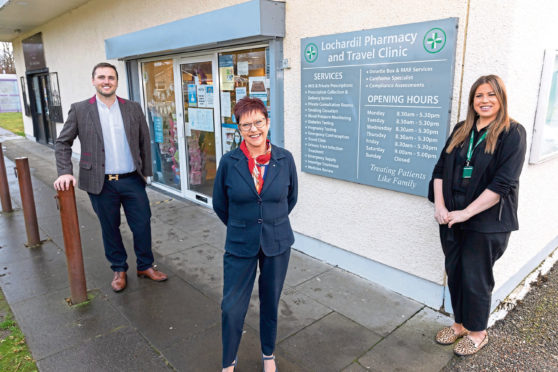 ODx office manager Karen Hubbard, centre, with John Mitchell and Lisa MacPherson of Lorchardil Pharmacy.