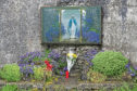 Mandatory Credit: Photo by Aidan Crawley/EPA/Shutterstock (7930604i)
A Shrine is Set Up at the Site of a Mass Grave of Up to 800 Children on the Site of the Former Mother and Baby Home in Tuam County Galway in Western Ireland 06 June 2014 the Home was Operated by the Catholic 'Sisters of Bon Secours' Between 1925 and 1961 Media Reports State That the Irish Government Will Launch a Broader Investigation of the Case After Bodies of Children Were Found in a Septic Tank First Bodies Were Found on the Ground Some Four Decades Ago But Were Initially Thought to Be From the 19th Century Famine in Ireland Ireland Tuam
Ireland Crime - Jun 2014