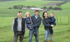 Event chairman Willy Millar, with hosts Robert and Hazel McNee and their children, Kate and Alan.