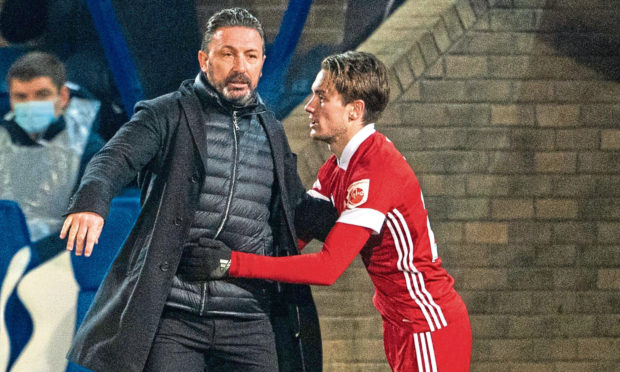 Scott Wright and Aberdeen boss Derek McInnes.