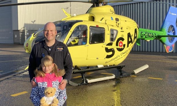 Arabella Winn has encouraged her classmates to help fund teddy bears for her air ambulance pilot father to give to seriously sick or injured children.