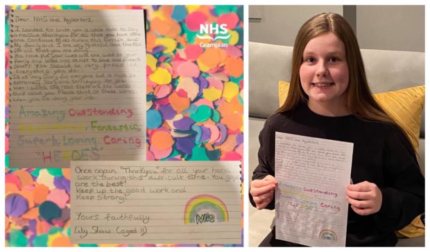 Lily Shaw with her letter to the NHS.