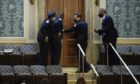 U.S. Capitol Police secure a door as protesters try to break into the House Chamber at the U.S. Capitol on Wednesday, Jan. 6, 2021, in Washington. (AP Photo/J. Scott Applewhite)
