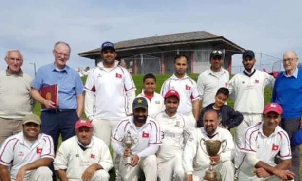 Doug Cruickshank, far left in back row, has died at aged 79.