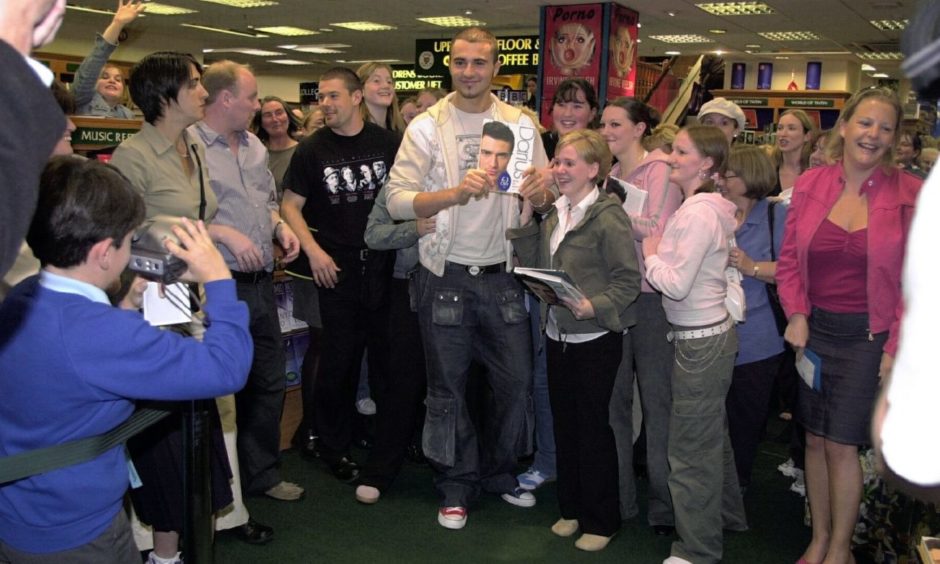 Hundreds of fans queued to see pop star Darius for a book signing at Ottakar's bookshop in the Trinity Centre in 2003. The singer went on to carve a successful career in West End musicals.