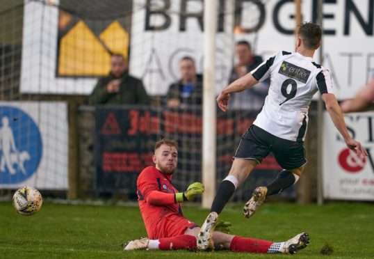 Turriff United goalkeeper and captain Fraser Hobday, left