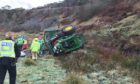 A man has been flown to hospital after a tractor crashed down an embankment near Fyvie