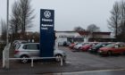 Three cars have been stolen from the Hawco dealer on The Wards in Elgin during an overnight raid.