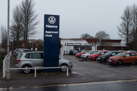 Three cars have been stolen from the Hawco dealer on The Wards in Elgin during an overnight raid.