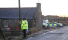 Police at the site near East Mains of Pitfour, Mintlaw. Picture by Paul Glendell
