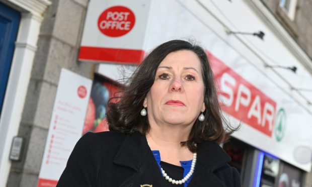 The Deputy Lord Provost Cllr Jennifer Stewart angry about the closure of the Post Office at Spar shop on Midstocket Road Aberdeen

Picture by Paul Glendell.