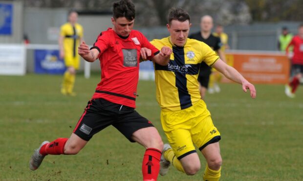 Wick Academy boss Gary Manson, right, was in action against Bo'ness United on Tuesday night.