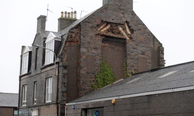 Masonry has fallen from one of the buildings on Hollybank Place.
Picture by Kath Flannery