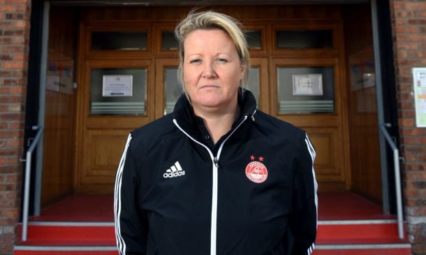 Emma Hunter outside Aberdeen's home ground of Pittodrie.