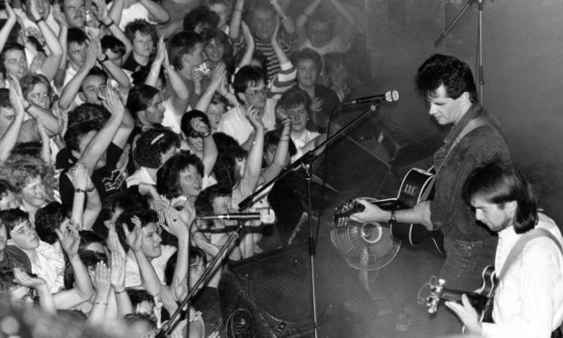 Runrig lead singer Donnie Munro and lead guitarist Malcolm Jones pictured at their 1988 gig at the  Music Hall. They played to a sold-out crowd as part of the Aberdeen Alternative Festival.