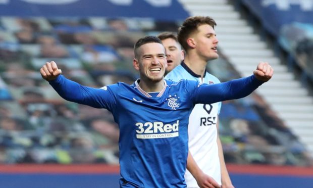 Ryan Kent celebrates scoring netting against Ross County.