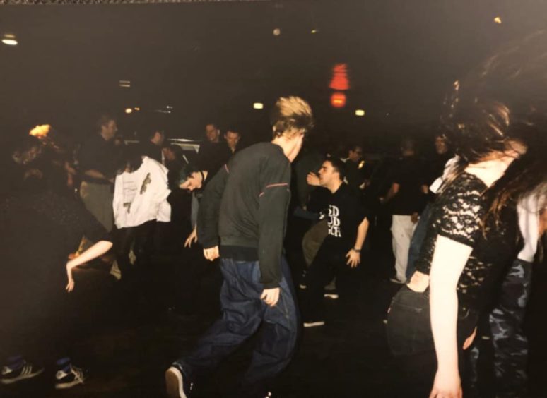 People moshing on the Mudd Club dancefloor in Aberdeen