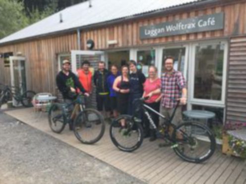 The Laggan Wolftrax team before the pandemic. Duncan Bailey of the Wee Bike Hub is on the far left, with development manager Cristiano Pizarro next to him.