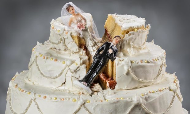 Bride and groom figurines collapsed at ruined wedding cake 
Spouses always seem to struggle to keep their relationship alive; Shutterstock ID 292107500; Purchase Order: Apollo food and drink; Job: Aunt Kate ; d4a9a53f-16ed-471b-a360-5dfd56b0c159