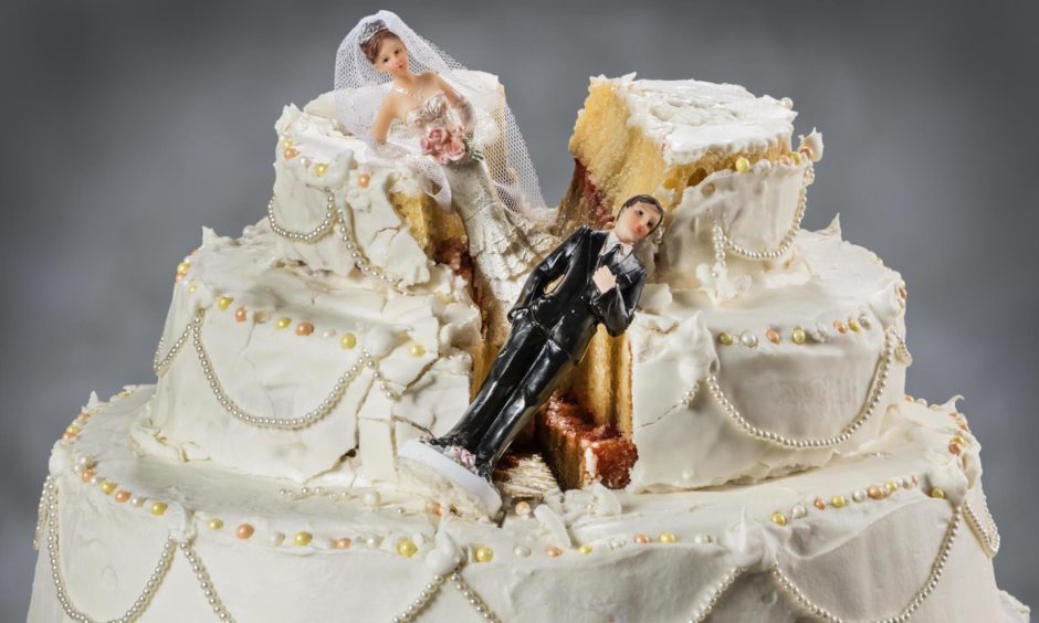 Bride and groom figurines collapsed at ruined wedding cake
Spouses always seem to struggle to keep their relationship alive; Shutterstock ID 292107500; Purchase Order: Apollo food and drink; Job: Aunt Kate ; d4a9a53f-16ed-471b-a360-5dfd56b0c159