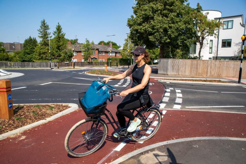 A cyclist on the UK's first Dutch-style roundabout, opened in Cambridge last year.