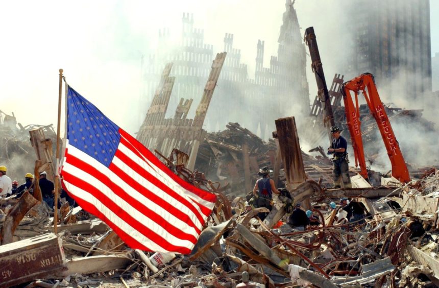 AMERICAN NIGHTMARE: Rescue workers search for survivors among the ruins of the World Trade Centre at Ground Zero in 2001.