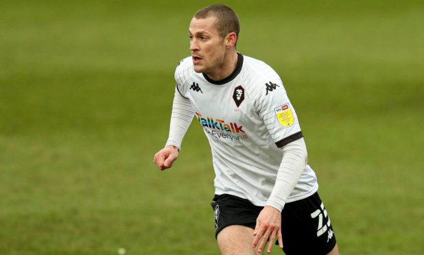 Paul Coutts playing for Salford City