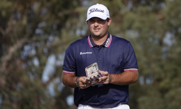 Patrick Reed walks off after his round on the north course of Torrey Pines during the first round of the Farmers Insurance Open.