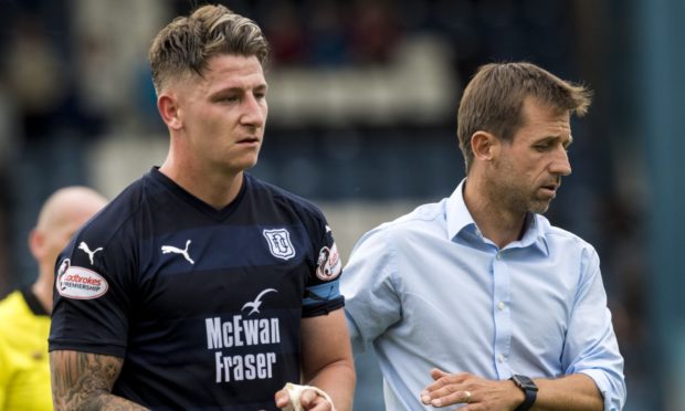 Ex-Caley Thistle defender Josh Meekings with his former Dundee boss Neil McCann.