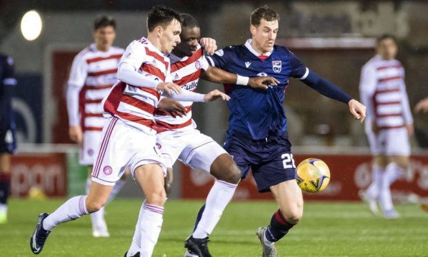 Hamilton's Reegan Minmaugh and Hakeen Odoffin (centre) battle with Ross County's Jordan White.