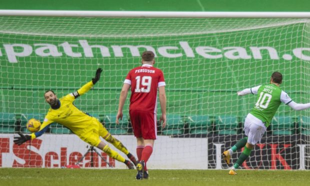 Hibernian's Martin Boyle makes it 1-0 from the penalty spot  against Aberdeen.