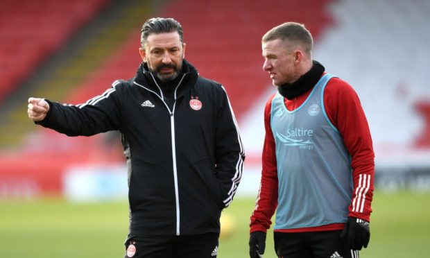 Jonny Hayes, right, is back in the Aberdeen side