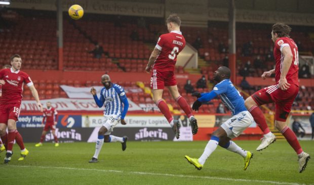 Callum Hendry heads in Aberdeen's first goal in seven games.