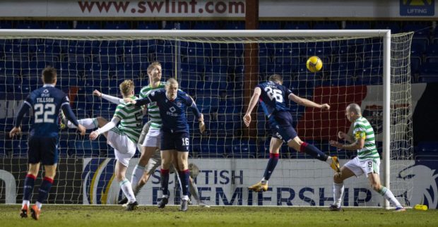 Ross County striker Jordan White heads home the winner against Celtic in February.