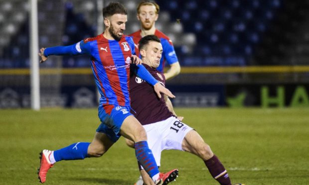 Sean Welsh in action for Caley Thistle.