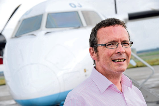 Managing director of Highlands and Islands Airports Inglis Lyon at Inverness Airport.