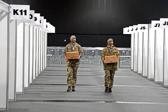 Royal Scots Dragoon Guards help to set the stage for the mass vaccination centre ‘show’ at the P&J Live arena