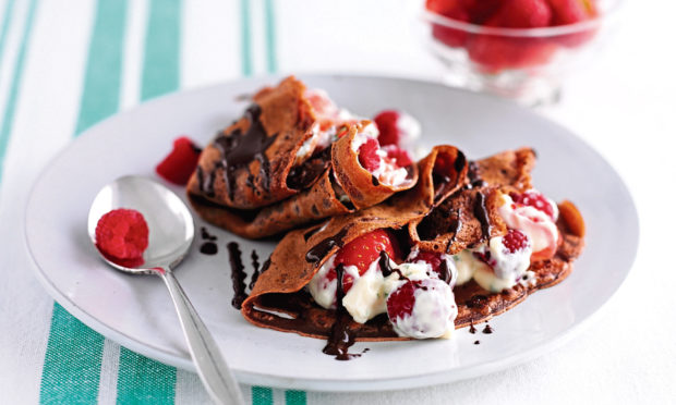 Chocolate berry pancakes with minted yoghurt.